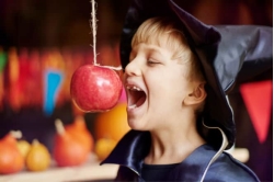 apple hanging on a string